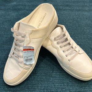 Slip in casual tennis, white with light tan with trim .